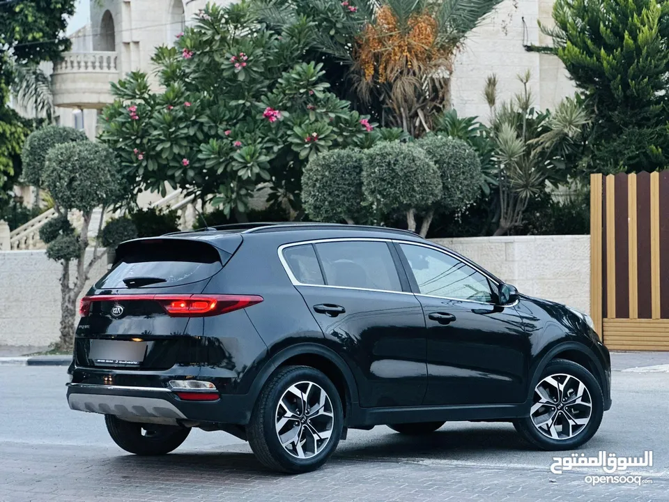 كيااا سبورتاج مطور 2000 بنزين 2*4 الجيب بالكراتين فل اضافات ملغم امكانية البيع نص بالنص الله يبارك