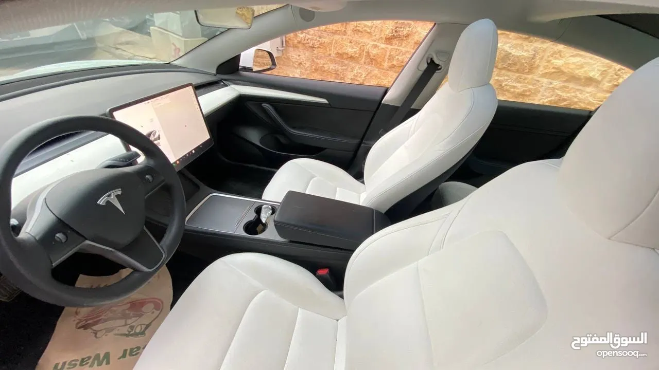 Tesla model 3 2023 standard plus ابيض