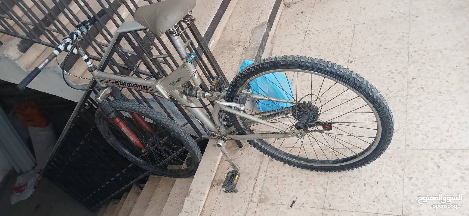 بسكليت نوعو نيسان بس انا حاطط لزيق على الاسم كوشوك جديد