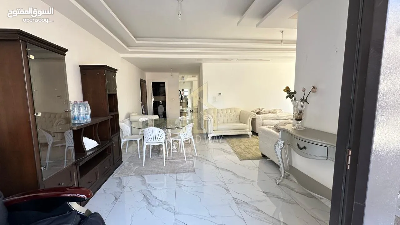 في أجمل مناطق الرابيه شقة أرضيه 196م مع ترس 50م بتشطيبات راقية / ref 9547