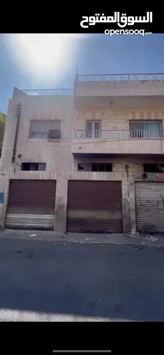 فرصة إستثمارية عمارة تجاري طابقين للبيع - جبل الحسين بالقرب من موقع جبل القلعة الأثري