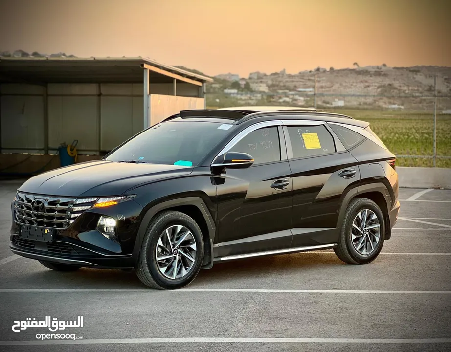 هونداي توسان/2022 فل الفل فتحة سقف بانوراما  2x4 ///240Hp بنزين + كهرباء  ( Haybrid) 1600cc