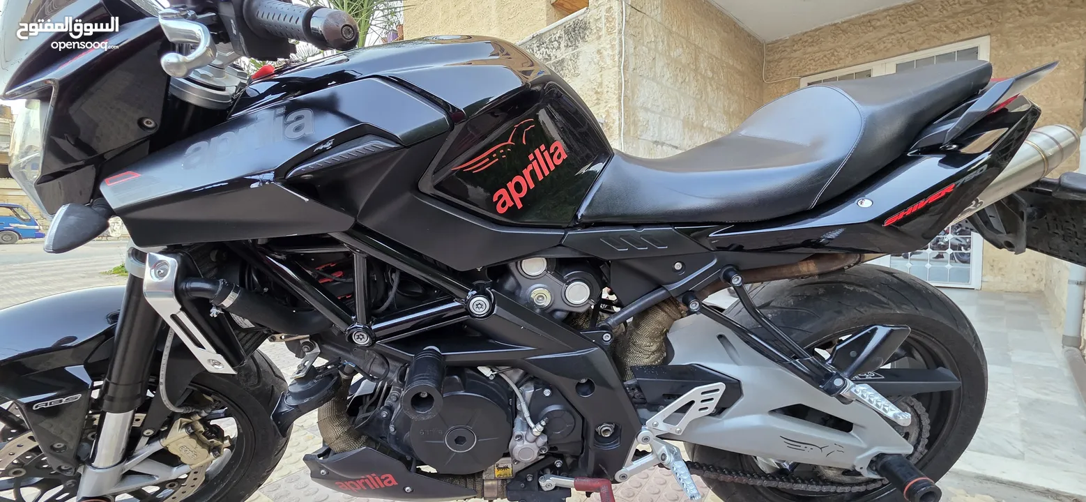 دراجة ابريليا 750 cc بحالة ممتازة 2016 ماشية 24000 فقط مالك ثاني صيانة دورية في الشركة 3200 دينار