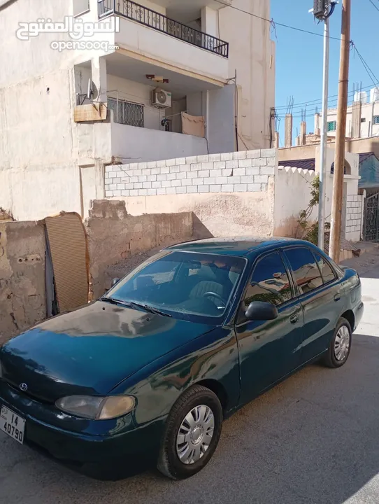 هونداي اكسنت توماتيك اصلي موديل 95 مكيف ثلاجه ترخيص شهر 3/2026 سياره زي ما بالصور واحلى