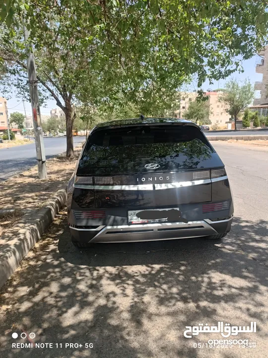 سياره موديل 2022 ايونك 5 كهربائيه لون اسود ميتاليك دفع رباعي اكبر بطاريه تمشي فوق 550 كيلو سبعه جيد