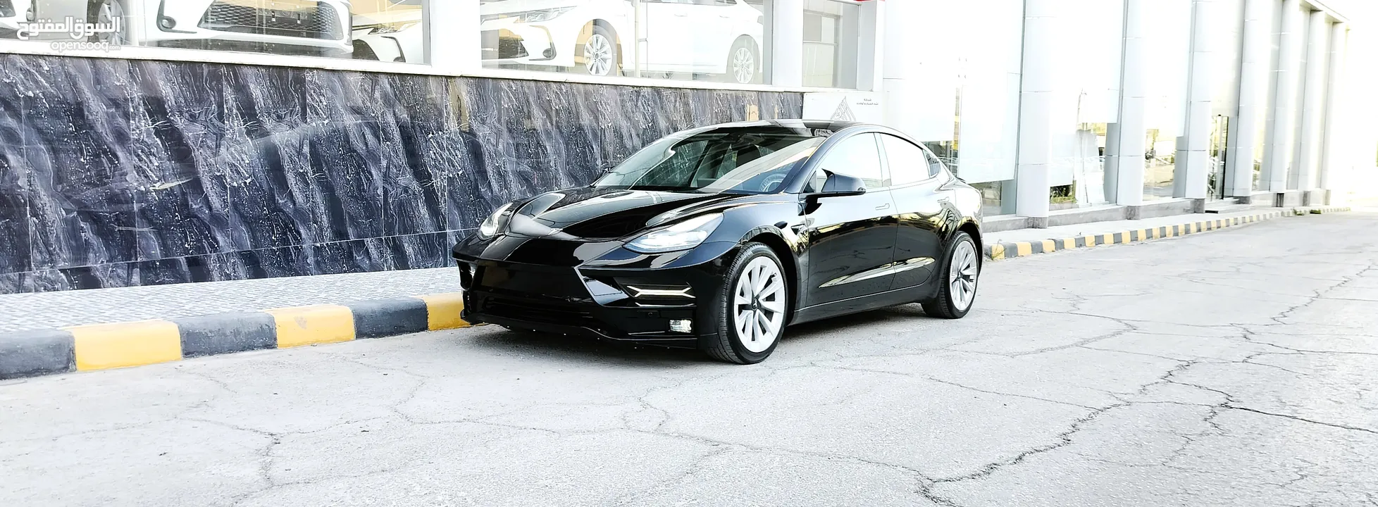 تيسلا 2023 model 3 كت لامبرغيني امامي لون مميز اسود ملوكي جنط 19 بحالة الوكالة للبيع بسعر لقطة