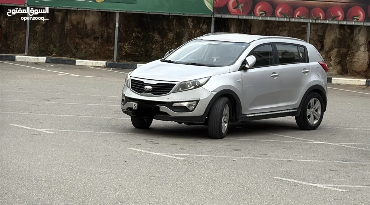 سبورتاج ديزل ماتور 2000 اتومات 4*4 اصل برايفت فحص ممتاز