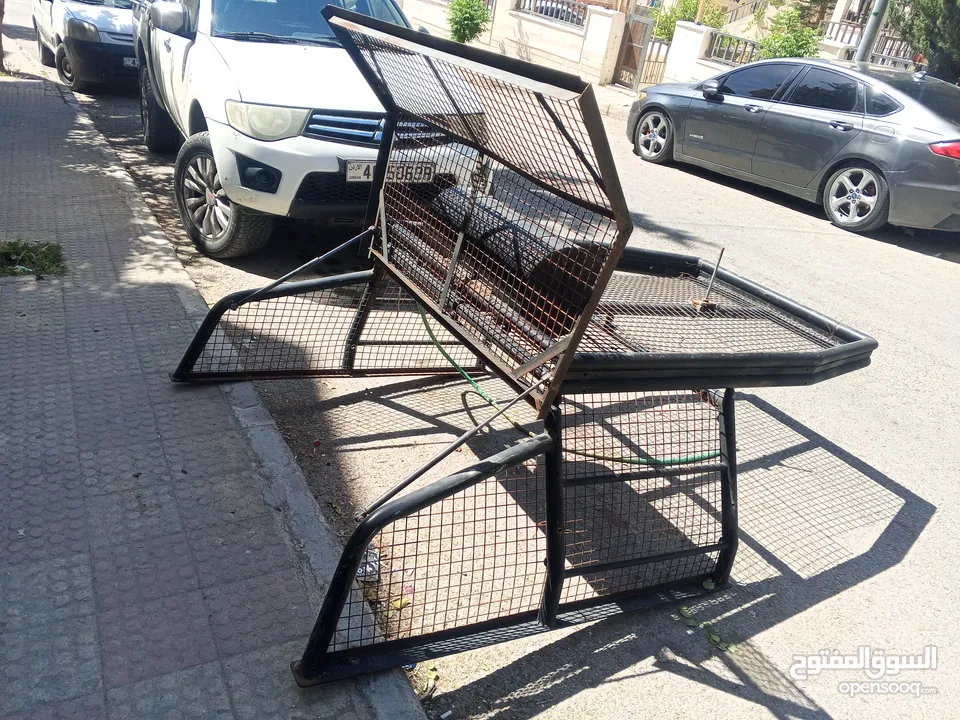 رول بار مع سلة وشبك (غرفة شبك) لبك اب ميتسوبيشي من موديل 2000 ولغاية 2006 بحالة الوكاله