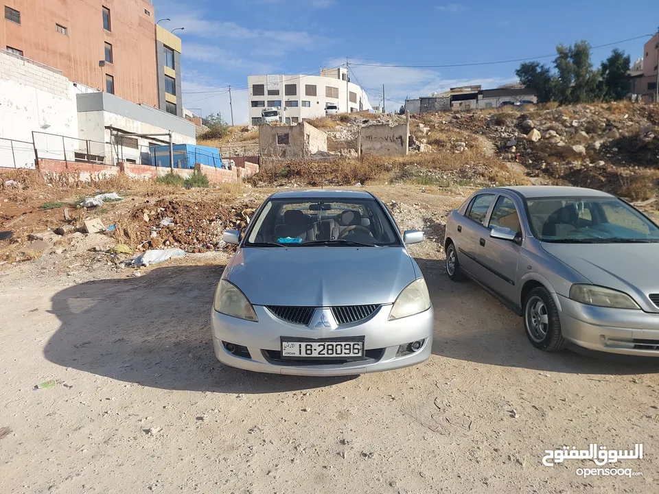 لانسر 2005 وارد الكويت 4 جيد ماتور 1600 الاصلي "الملا"