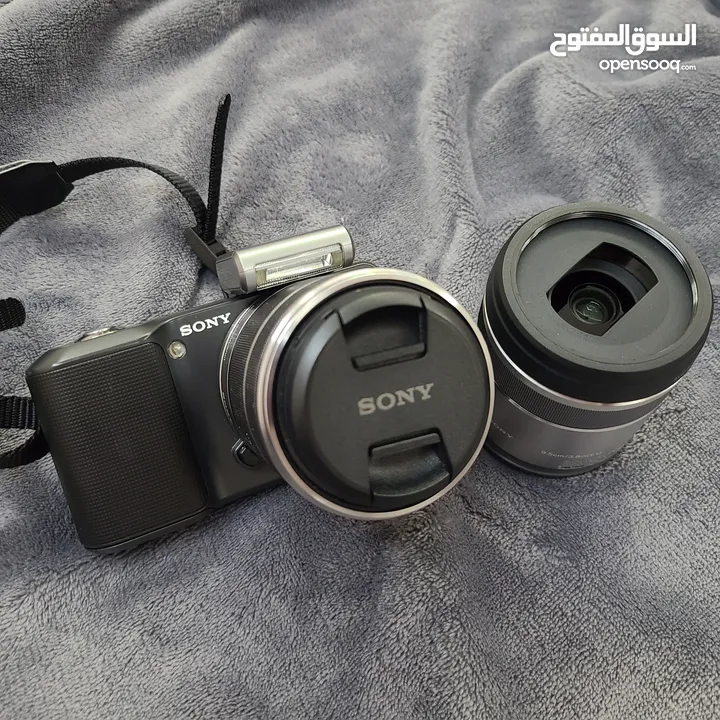 sony NEX-3 camera with 2 lenses