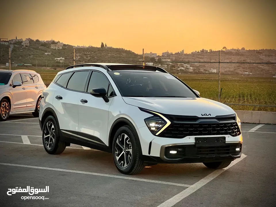 كايا سبورتاج /2022 فل الفل فتحة سقف  2x4 ///240Hp بنزين + كهرباء  ( Haybrid) 1600cc