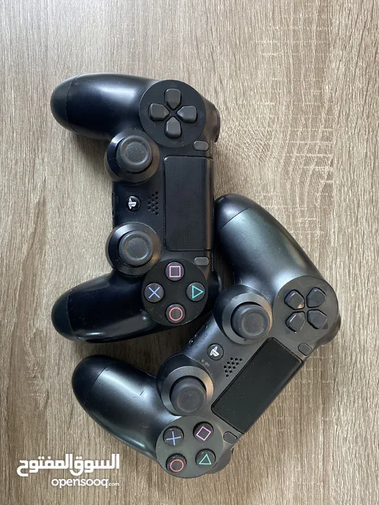 1TB Playstation 4 Pro (Used) 2 Controllers.