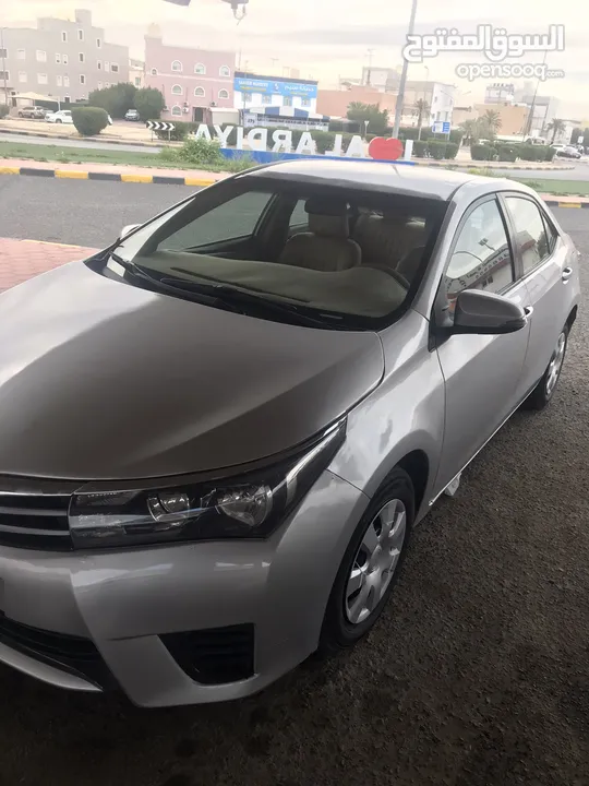 كورلا 2015 ابيض 1600 CC شرط الفحص 1600 نهائي