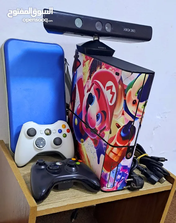 للبيع جهاز العاب xbox 360 معدل Gtag مع كاميرا و سعة تخزين 250 جيغا مع مجموعة كبيرة من الالعاب الفخمة