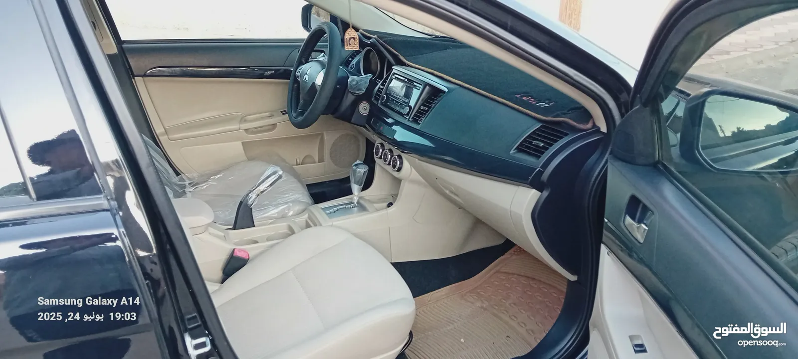 متسوبيشي لانسر فراشة موديل 2015 فحص مرفق مع الصور بحالة الوكاااااالة  ماشية 49 الف km  أصلي