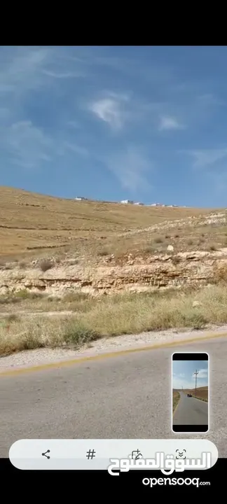 ارض للبيع 10 دونمات واجه 100 متر على شارع 20 معبد تبعد عن اشاره بلعما 1500 متر