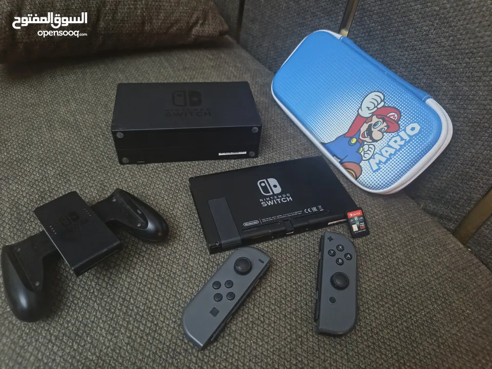 جهاز نينتدو سويتش حالة ممتازة جدا مع أغراضه ولعبة
