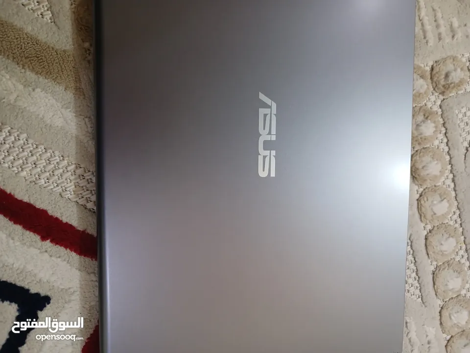 Asus Vivobook 15.6 inch شاشة لمس و كارتونه موجود