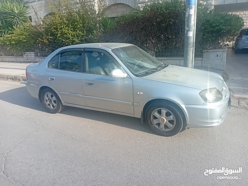 هونداي فيرنا لون سلفر موديل 2004 مرخصة  فحص 4 جيد للبيع بشكل مستعجل