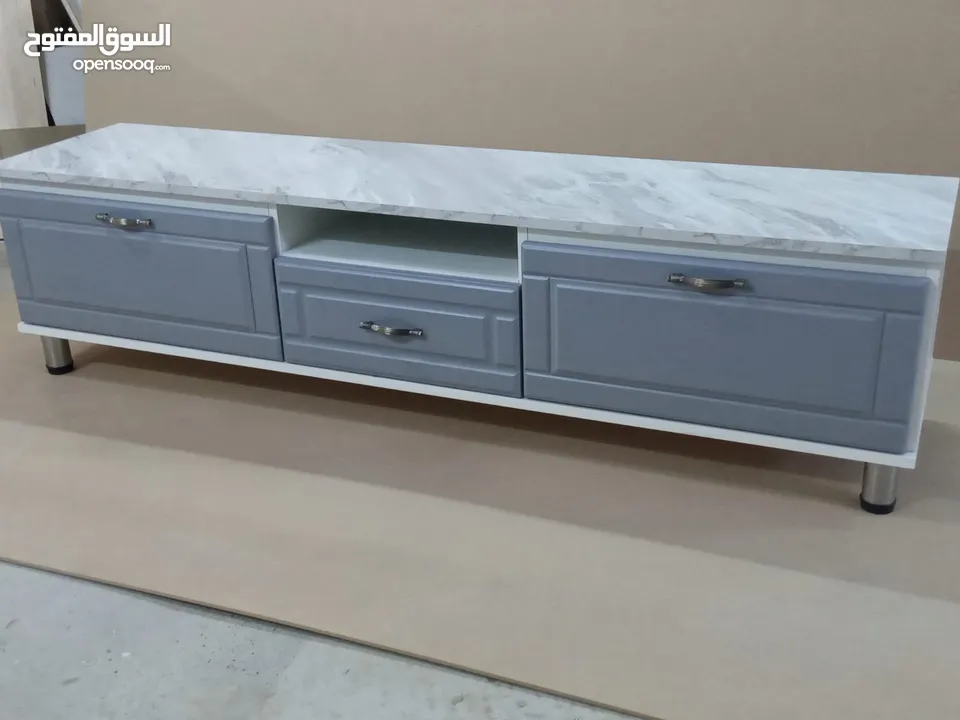 طاولات شاشه ديكورات داخلي خشب لامنيت 18م الون حسب الطلب الون حسب الطلب كفاله 5سنوات على اعمالنا