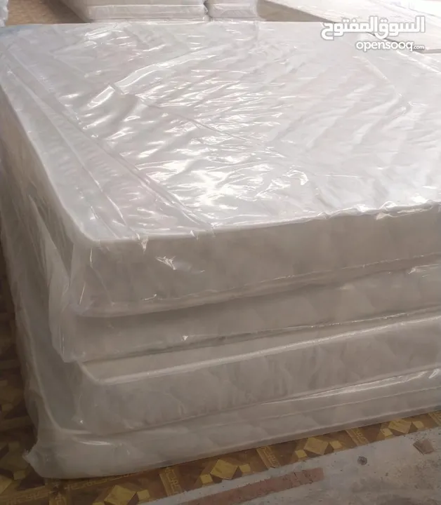 Bed with mattress on wholesale price delivery with extra charges according to the location