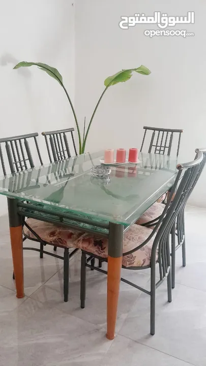 طاوله سفره زجاج مع سته كراسي