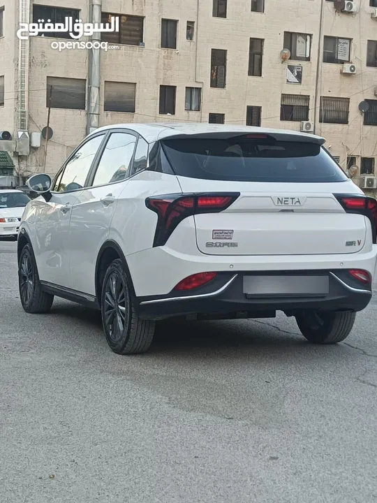 نيتا v موديل 2023 لون ابيض لؤلؤي فحص كامل جمرك حديث اتسكور 89% فحص soc 100% استخدام شخصي مثبت كارسير