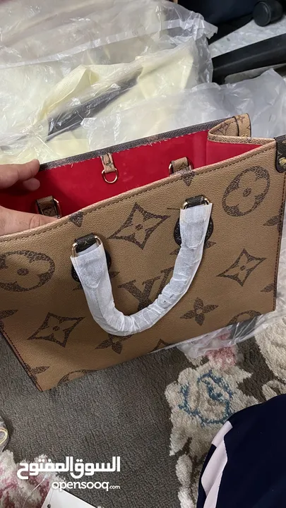 شنط يد LV / Prada