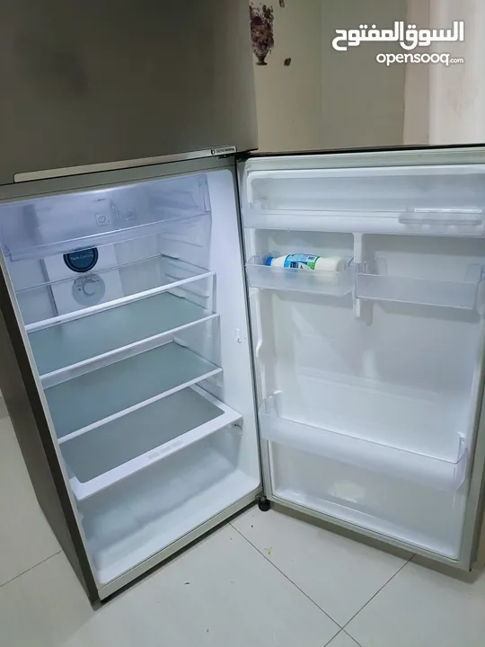 Slightly used Samsung Refrigerator with additional features.