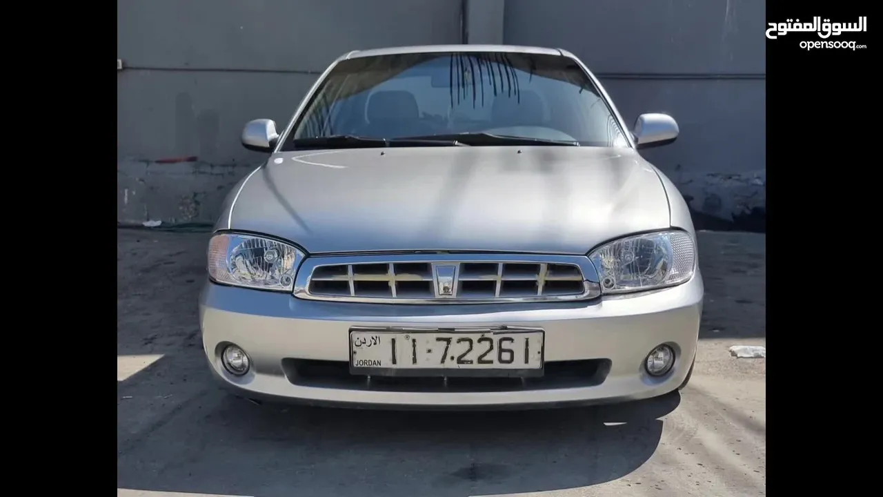 كيا سبيكترا 2001 بسعر 2400 جير عادي سياره نظيفه جدا  kia spectra 2001