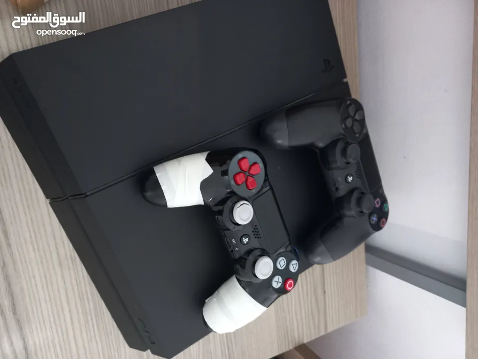 ps4 fat 500gb عليها للعاب ودراهين وكرتونه