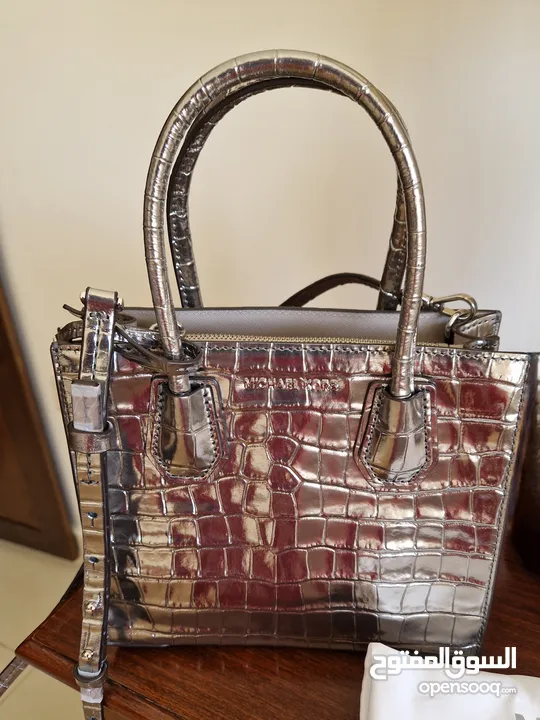 Like new Michael Kors crossbody bag metallic colour