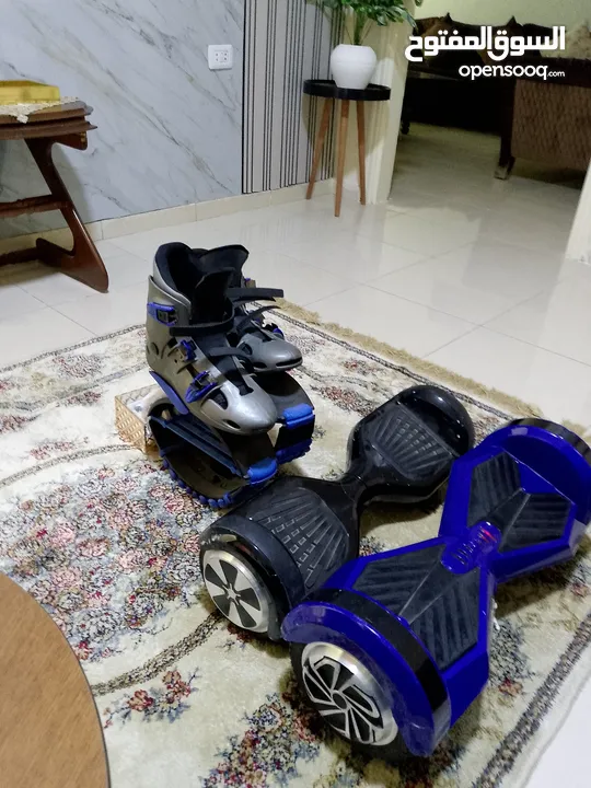 كمرا و هوفر بورد عدد 2وسكيت نطاط ودفي دي دتي في ديجيتال جميعهم بحاله ممتازة الهوفر بورد بدون شاحن