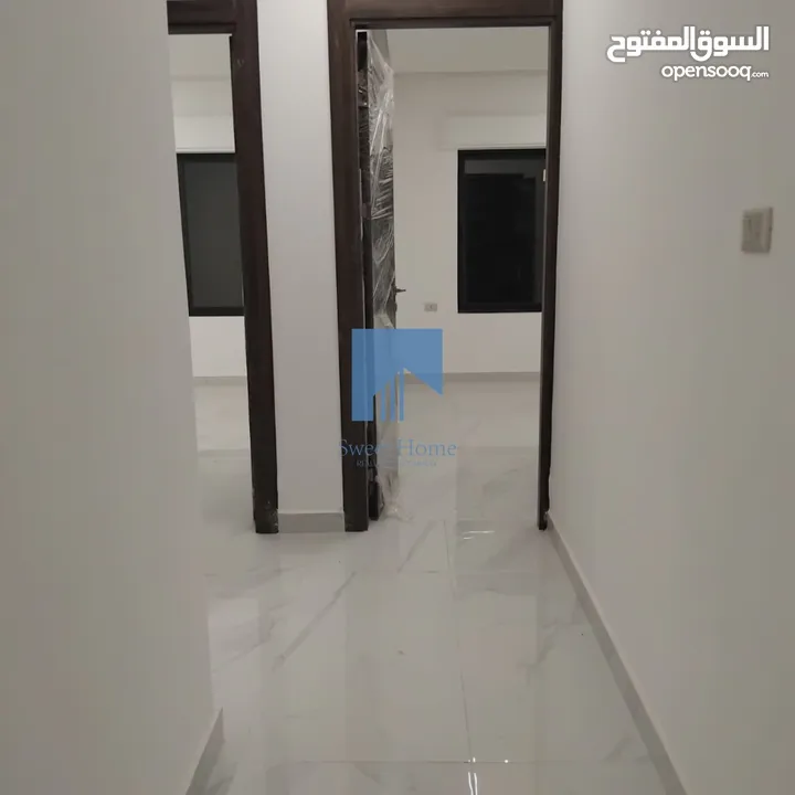 شقة فاخرة للبيع في تلاع العلي  - قرب دوار الواحة 95م مع ترس 100م تشطيب سوبر ديلوكس لم تسكن