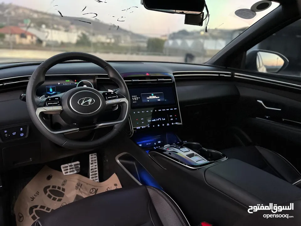 هونداي توسان 2023/ فل الفل فتحة سقف بانوراما  2x4 ///240Hp بنزين + كهرباء  ( Haybrid) 1600cc