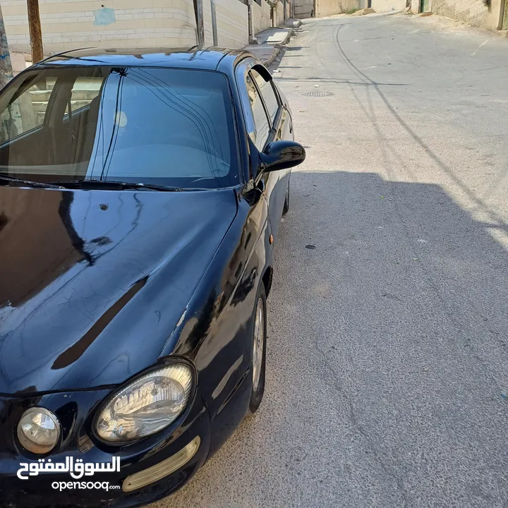 كيا شوما 1999