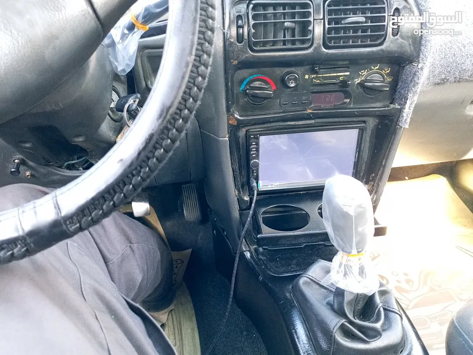 ميتسوبيشي لانسر موديل 93للبيع  مرخصة لغاية شهر 2/2026 سعة المحرك 1300cc