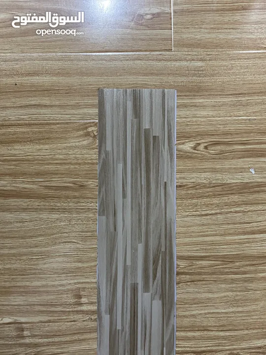 ارضيات لاصقة باركية وبورسلان