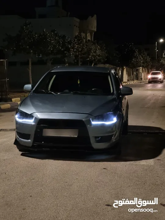 ميتسوبيشي فحص نظيف 100% موديل 2010 سياره كثير كثير ممتازه موتور 1005 جير موتور فحص 100% توماتيك المع