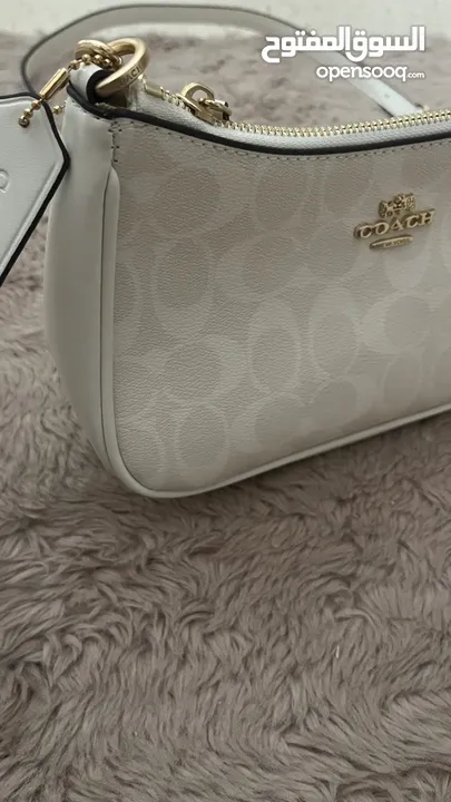 شنطة كوتش بيضا جديدة coach ماستر