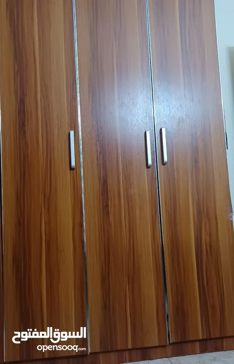 wooden 3 door cupboard