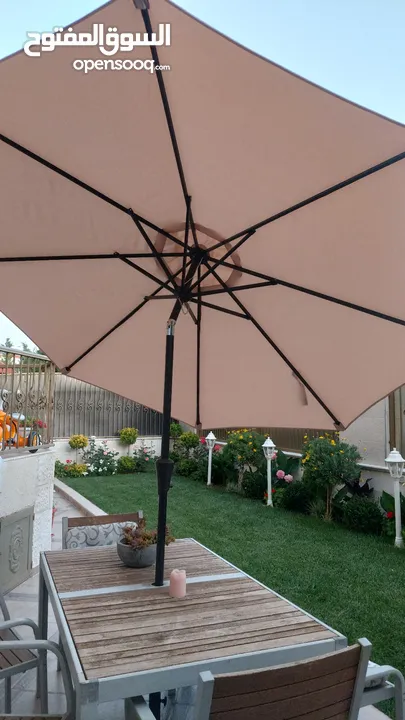 مظلة خارجية (شمسية) جديدة غير مستخدمة تصلك مغلفة