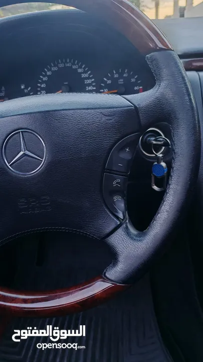 E200. 2002  قرش ونص 2002  رقم الهاتف بالوصف