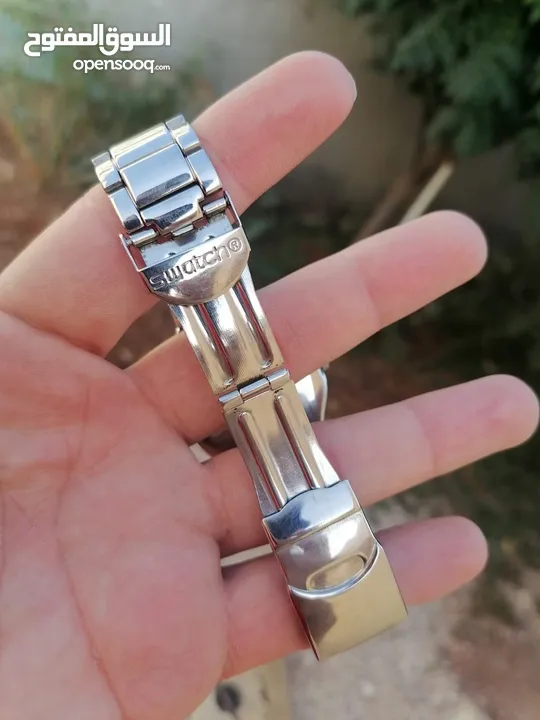 #SWATCH  سواتش سويسري اصلي لومينوس شباك للتاريخ  حجم 41 بحالة ممتازه  40 دينار