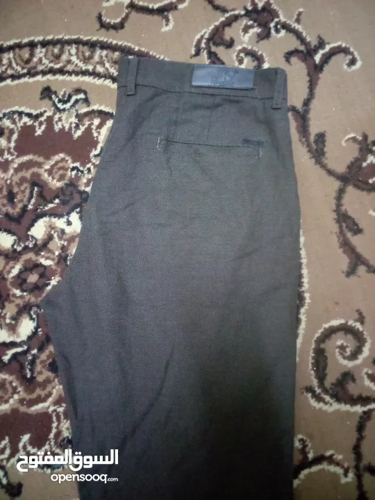 ملابس رجالي بحاله ممتازه بلبسو مقاس اكسين لارج بسعر 5 دنانير كامل