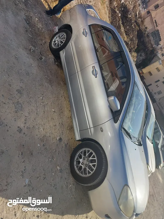 لانسر 2005 وارد الكويت 4 جيد ماتور 1600 الاصلي "الملا"