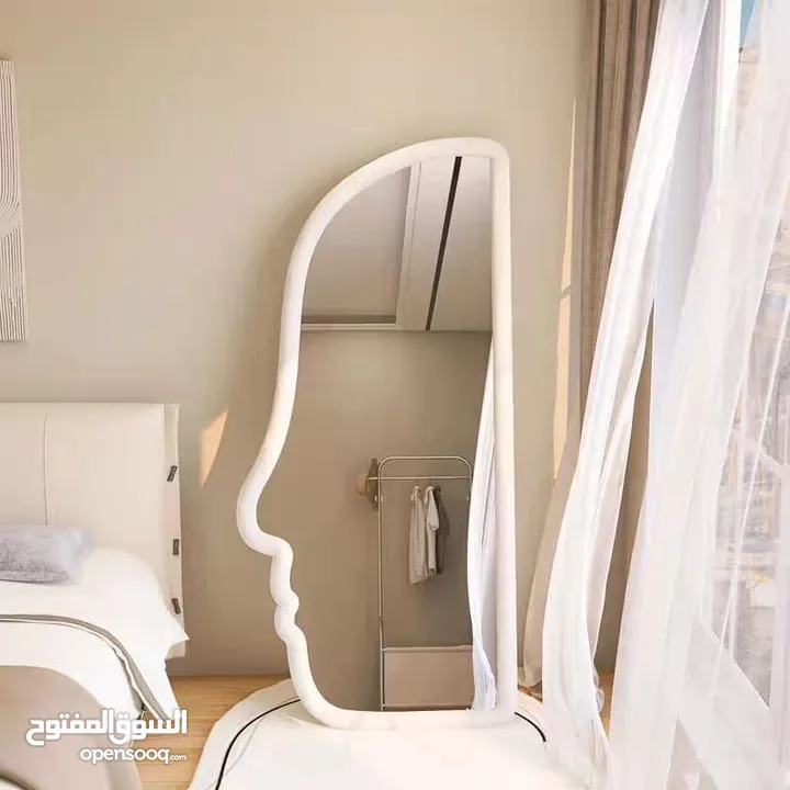 مرايا ترند عالمياً... تصميم موجي ومنحوت فخم يخلي أي زاوية تصير قطعة فن جاهزة للتصوير