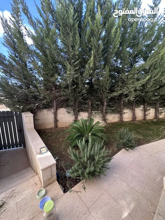 شقه مفروشة للايجار في دير غبار ارضية مع حديقه إماميه وترس خلفي .. مميزه جداً
