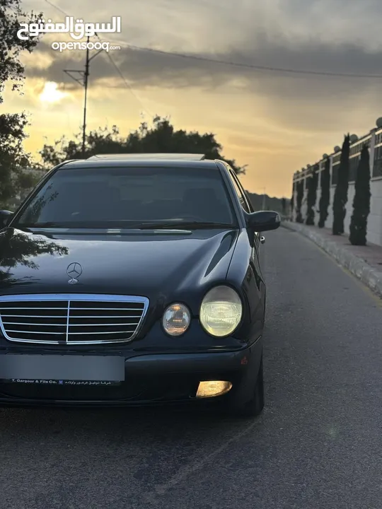 E200. 2002  قرش ونص 2002  رقم الهاتف بالوصف