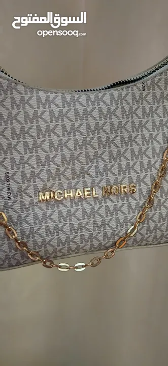 New black Chanel, Michael Kors & Louis Vuitton bags
